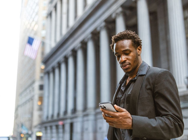 man looking at phone