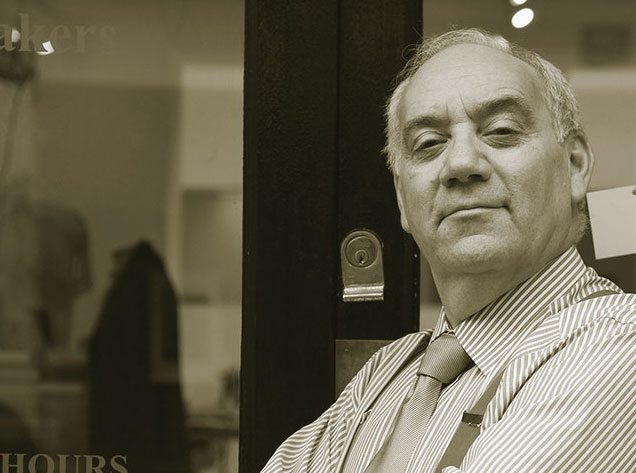 man in front of store front